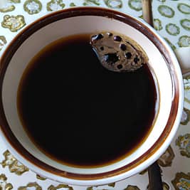 drinking black coffee